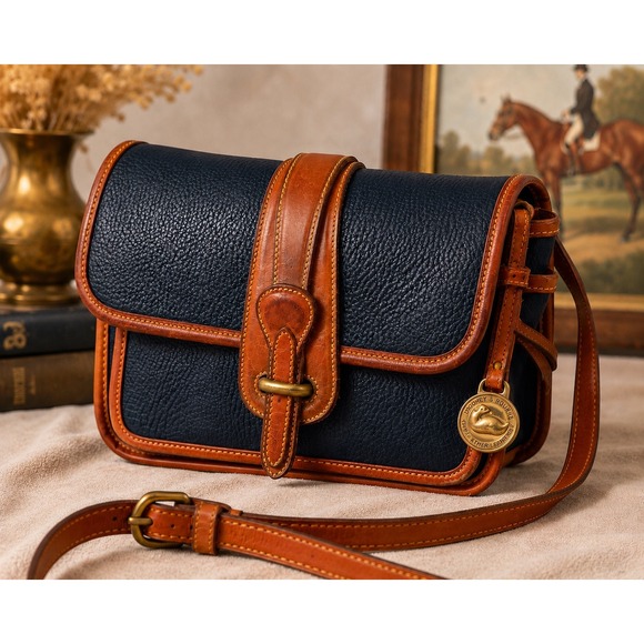 Dooney & Bourke Handbags - Vintage Dooney & Bourke Navy Cognac Leather Crossbody Saddle Crossbody Bag